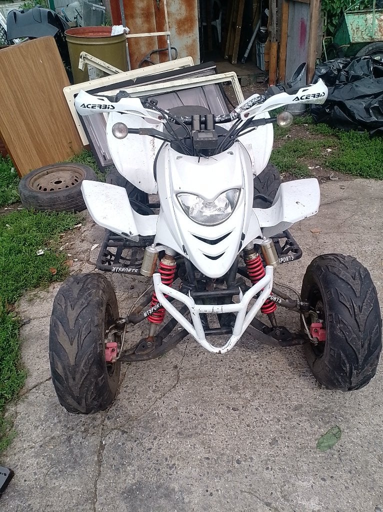 Vend ou échange quad 300 shineray