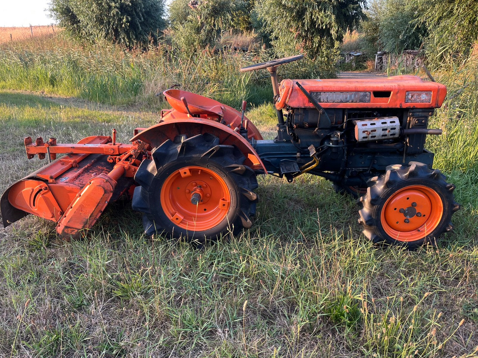 Kubota b6000 met grondfrees, Ophalen