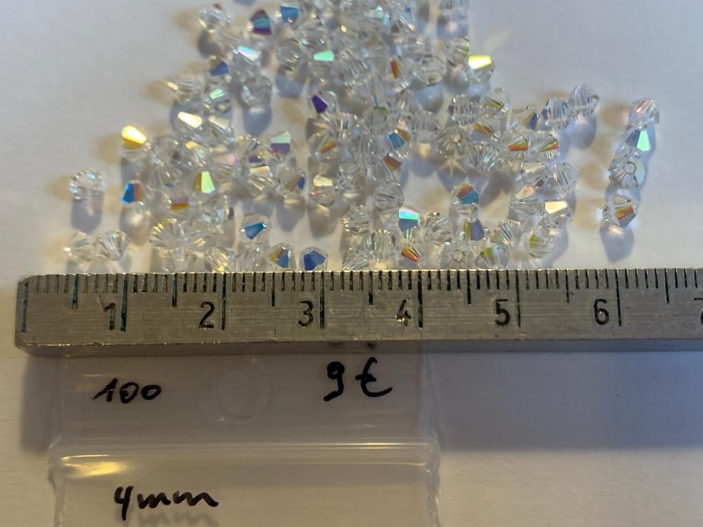 100 Swarovski tolletjes 4mm wit, Ophalen of Verzenden, Nieuw, Kraal