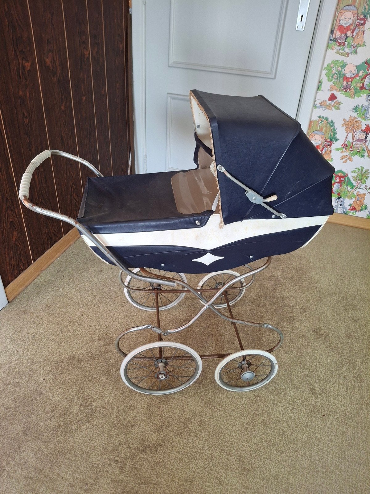 Vintage blauwe speelgoed poppenwagen, Enlèvement
