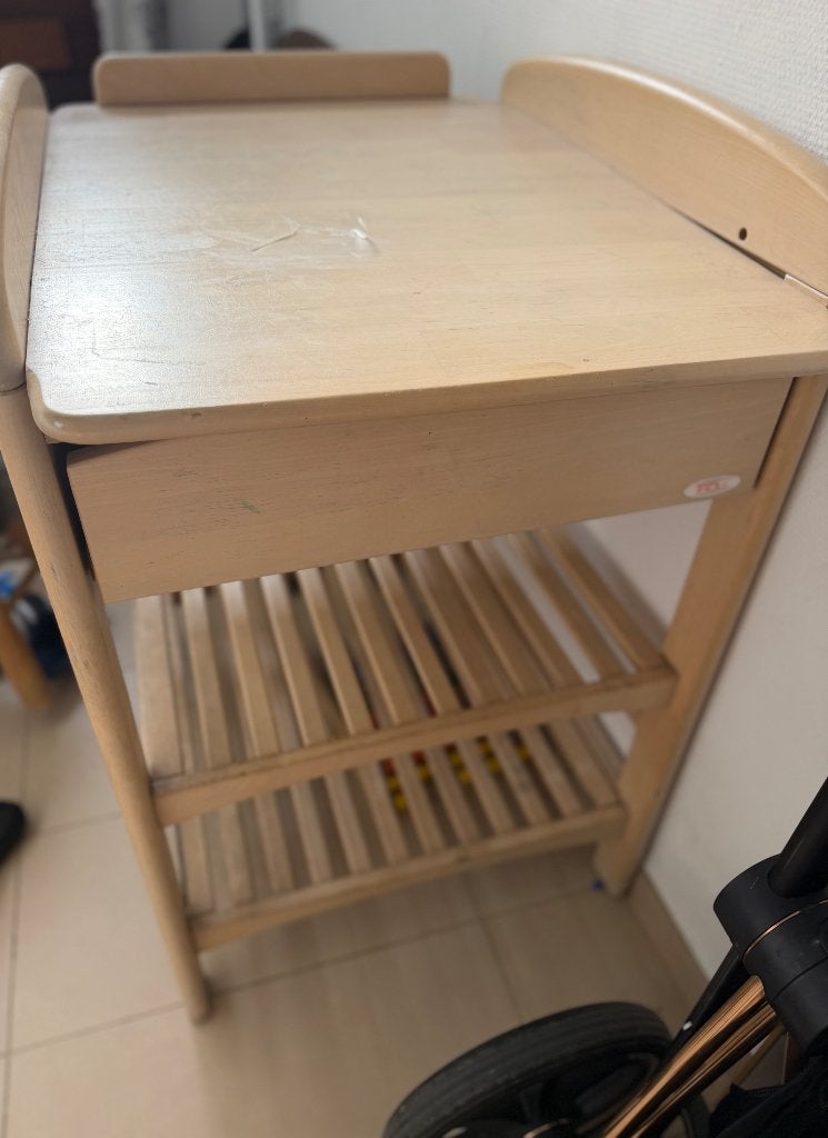Table à langé, Enlèvement