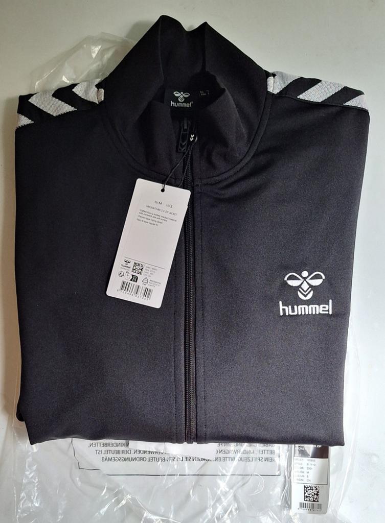 Hummel zwarte trainingjas, Ophalen