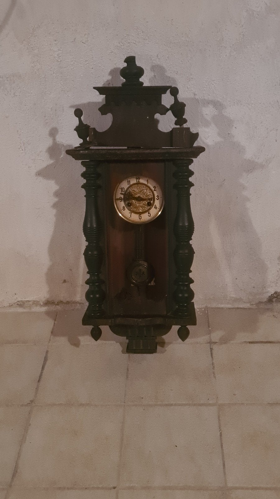 antieke muurklok, Ophalen