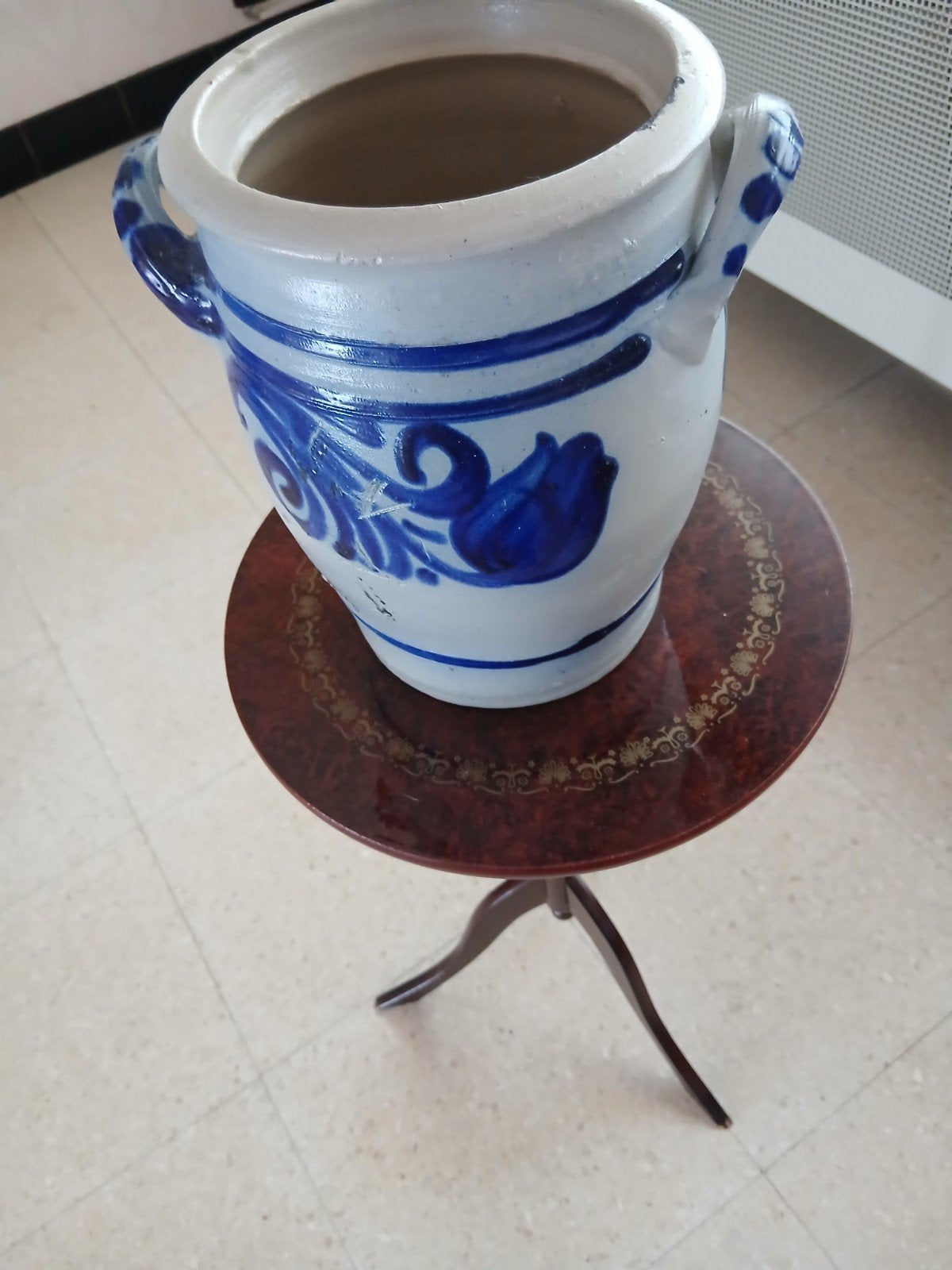 Oude boterpot of bloempot, Ophalen