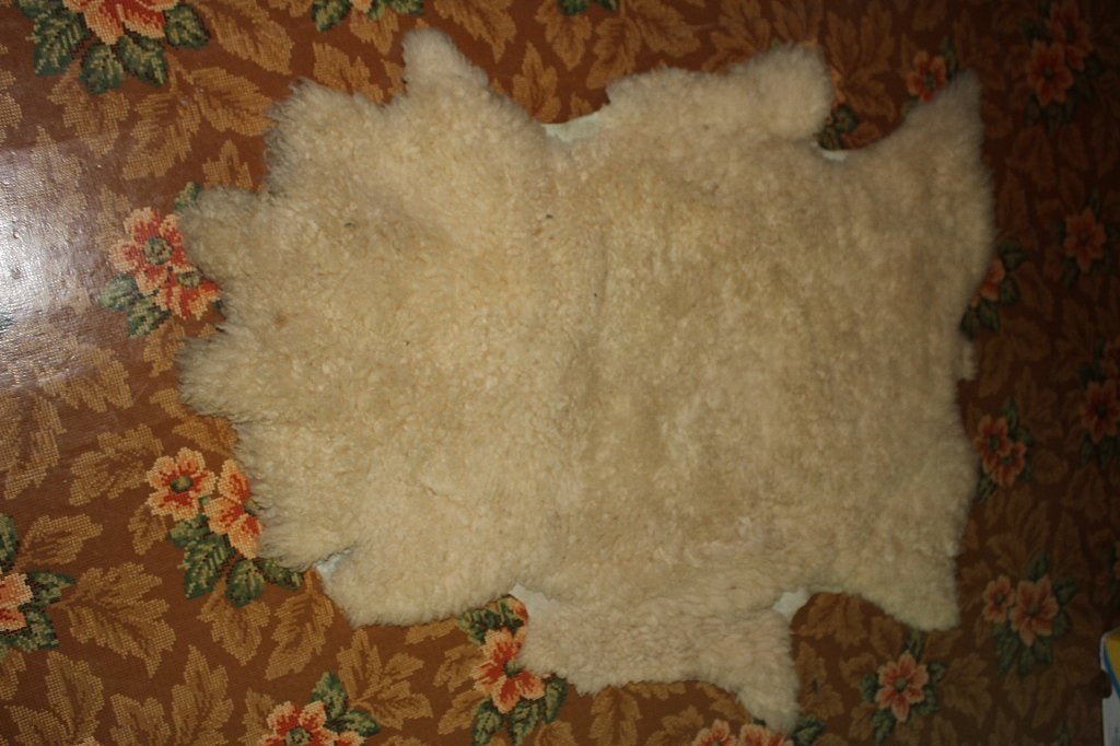 Schaapsvel tapijt, Huis en Inrichting, Ophalen, 100 cm, Gebruikt, Wol