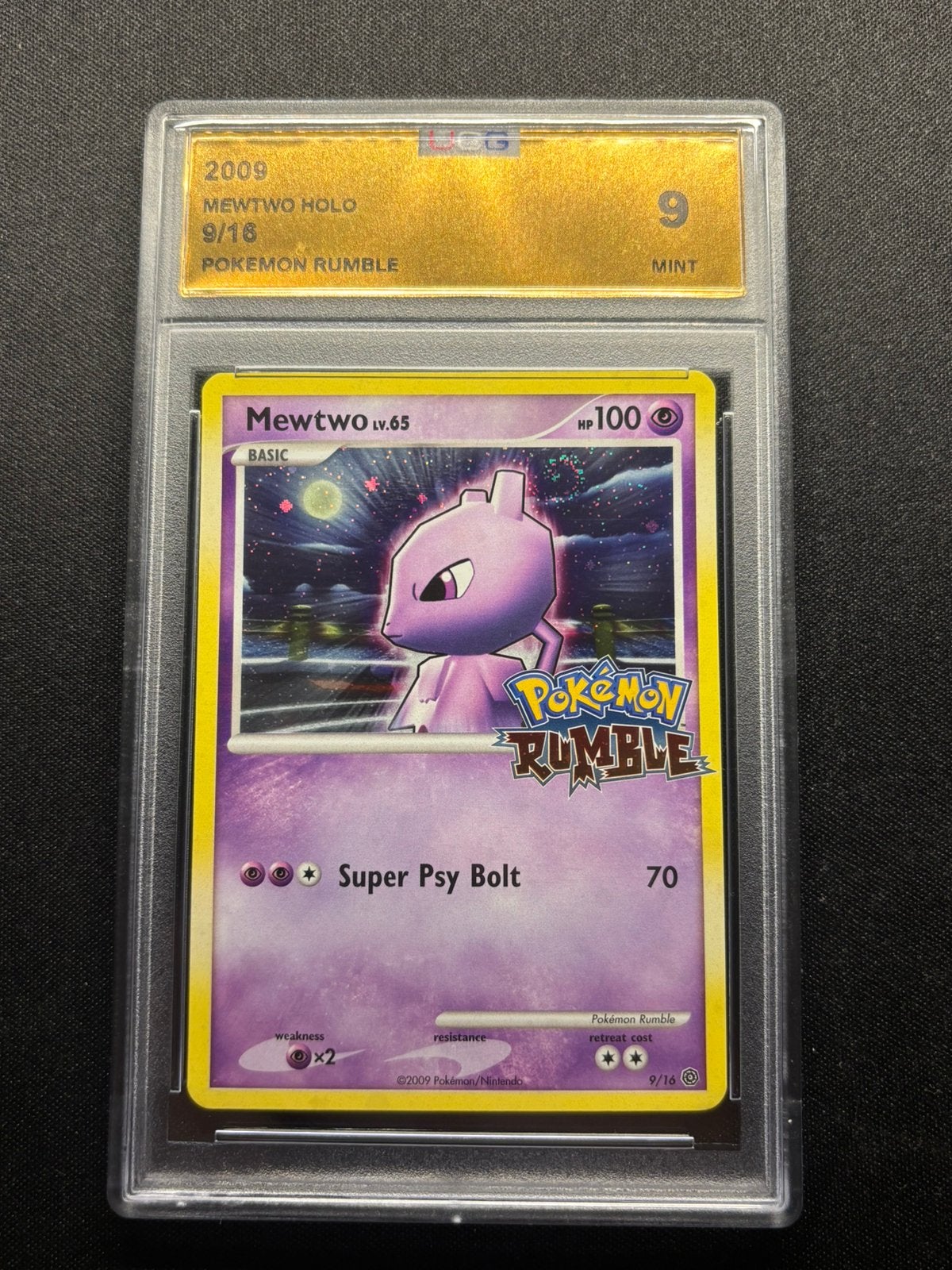 Mewtwo Holo (Swirl) 2009 Pokemon Rumble UCG Graded 9 Mint, Hobby en Vrije tijd, Verzamelkaartspellen | Pokémon, Ophalen of Verzenden