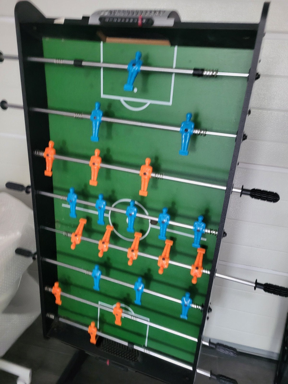 voetbaltafel, Ophalen