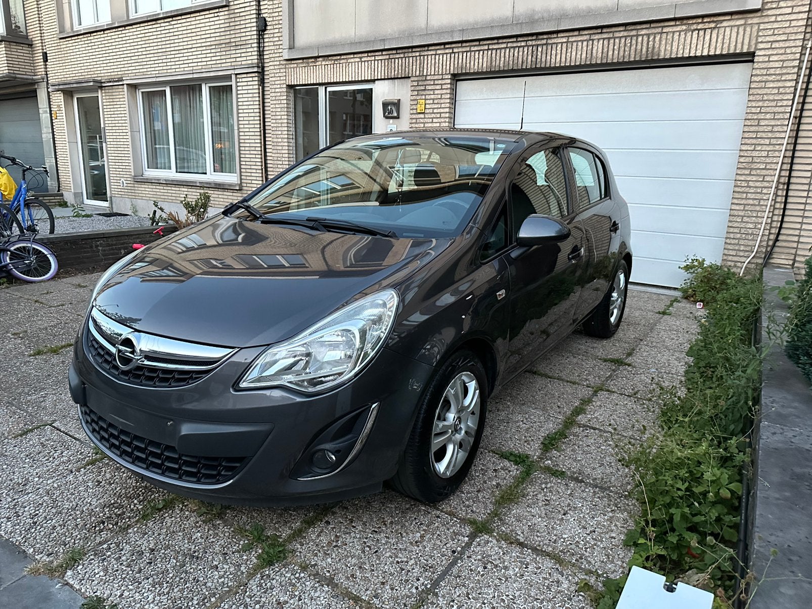 Opel. Corsa 1.2i Euro 5 2012 140.000km Gekeurd, Autos, Opel, Bluetooth, Euro 5, Achat, Carnet d'entretien