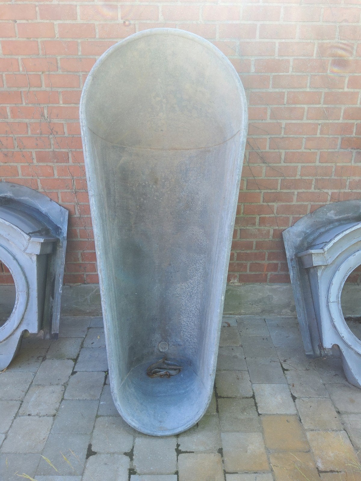 Zinken ligbad, Ophalen