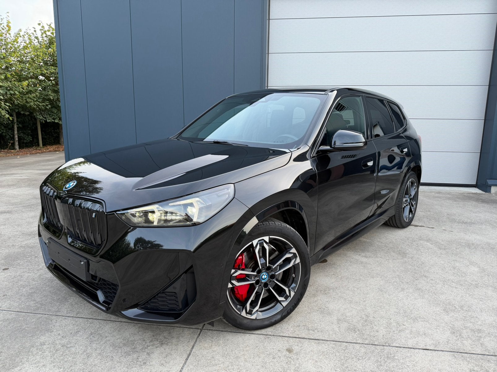 Bmw IX1 xDrive30e, Auto's, BMW, Automaat, Dealer onderhouden, 0 cilinders, Zwart