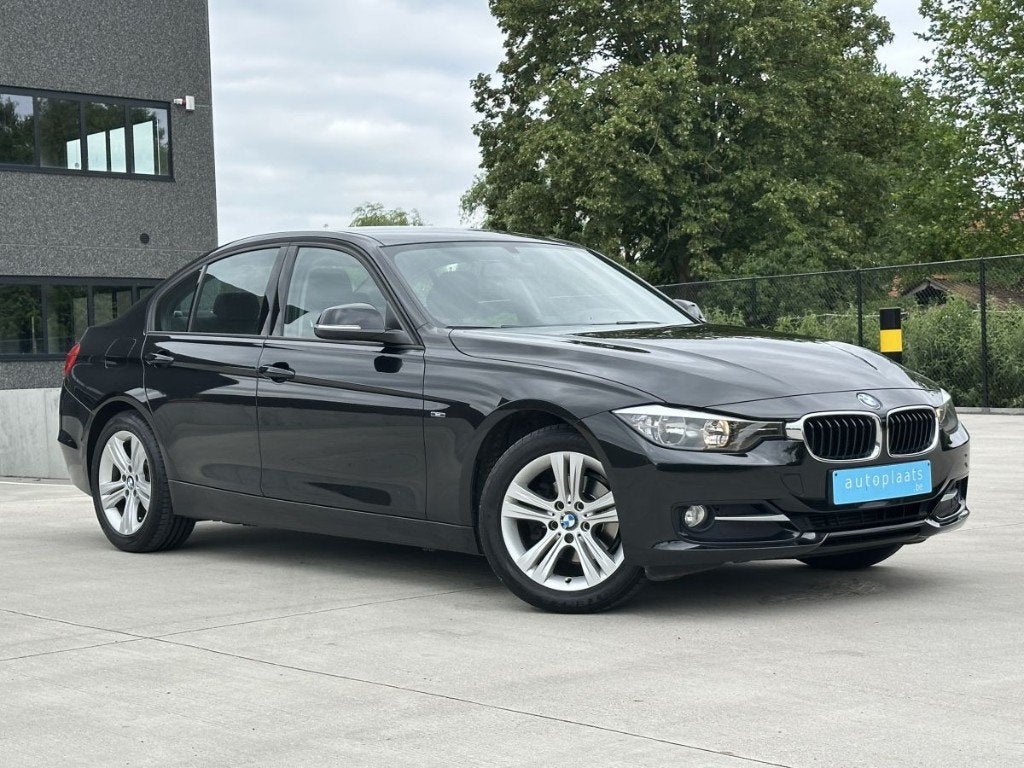 BMW 316i Berline Sport Line 66372km Eerste eigenaar, Auto's, 100 kW, Start-stop-systeem, Zwart, Bedrijf