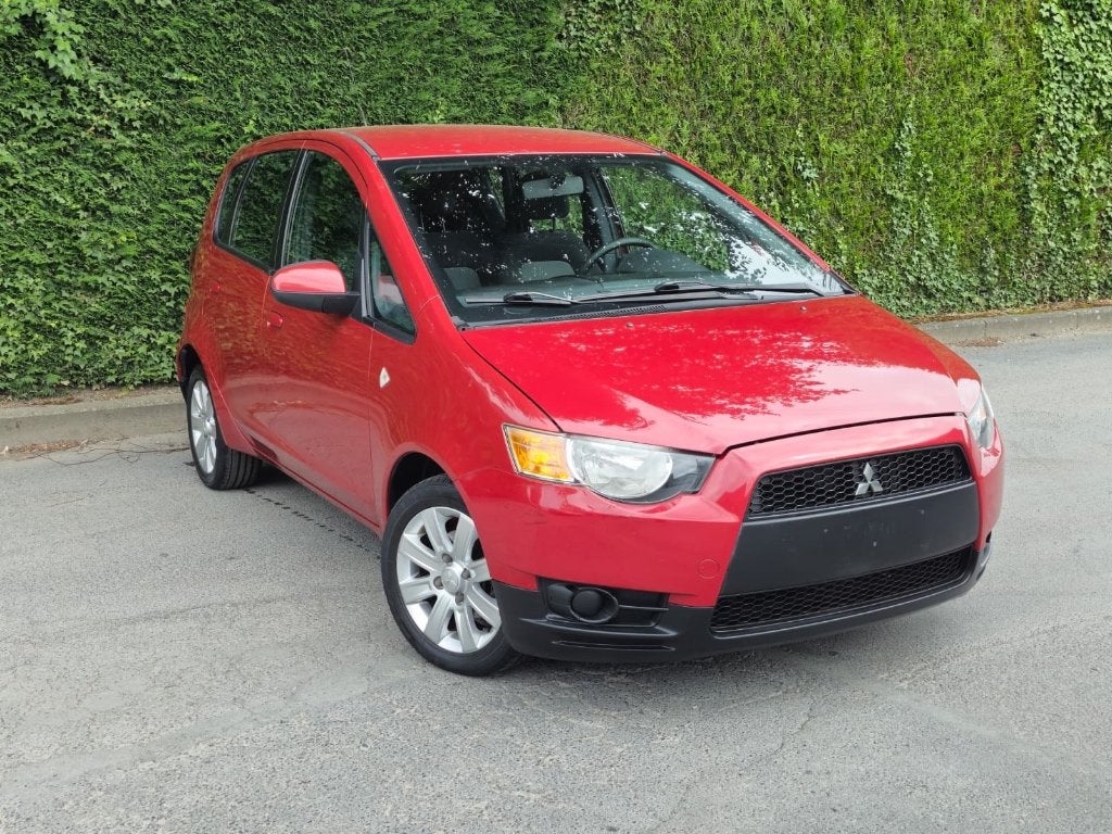 - Mitsubishi colt/2009/71000.km - 1,1I/essence, Autos, Mitsubishi, Rouge, Achat, Entreprise, Boîte manuelle