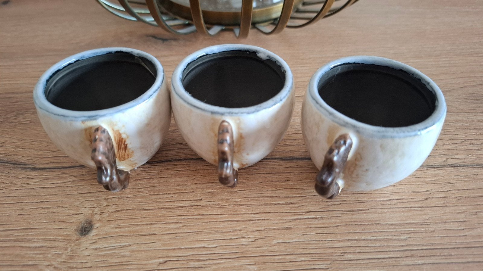 3 espressokopjes, Ophalen