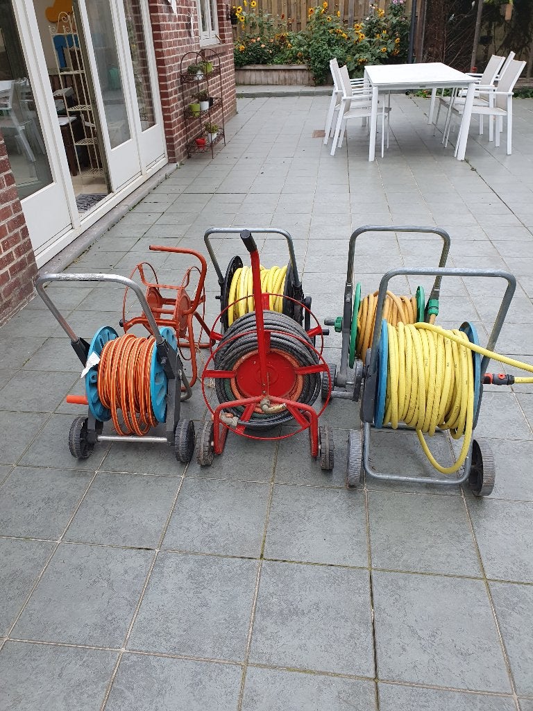 1 lot tuinslangen/haspels, Tuin en Terras, Ophalen