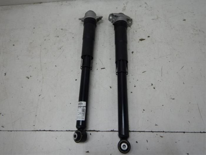 VW Golf 8 Schokdemper Schokbreker Set Achterzijde L+R, Ophalen of Verzenden, Gebruikt