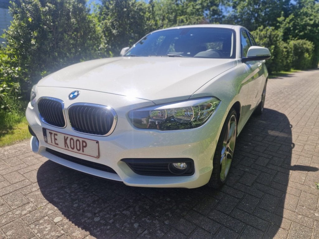 bmw 116i benzine euro6 57dkm gekeurd vvk en 1j garantie, Auto's, BMW, Bluetooth, Wit, 5 deurs, 3 cilinders