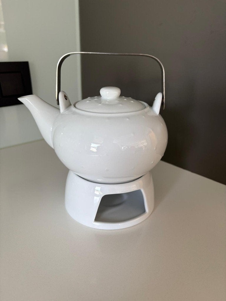 Mooie theepot in uitstekende staat op theelicht warmhouder, Huis en Inrichting, Ophalen, Landelijk/Boerenbont, Zo goed als nieuw