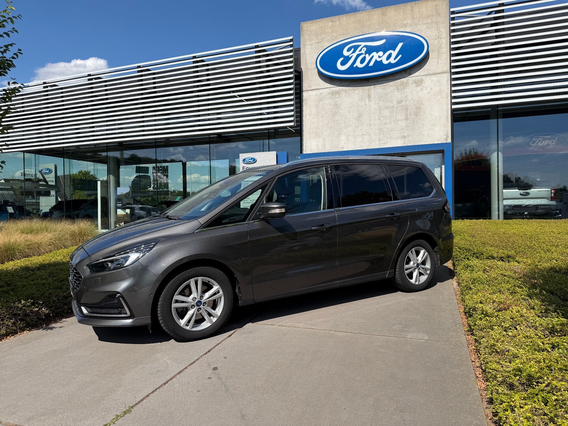 Ford Galaxy V-LINE 2.5 FHEV / 7-ZITPLAATSEN! (bj 2022), Auto's, Gebruikt, Overige kleuren, 7 zetels, Leder