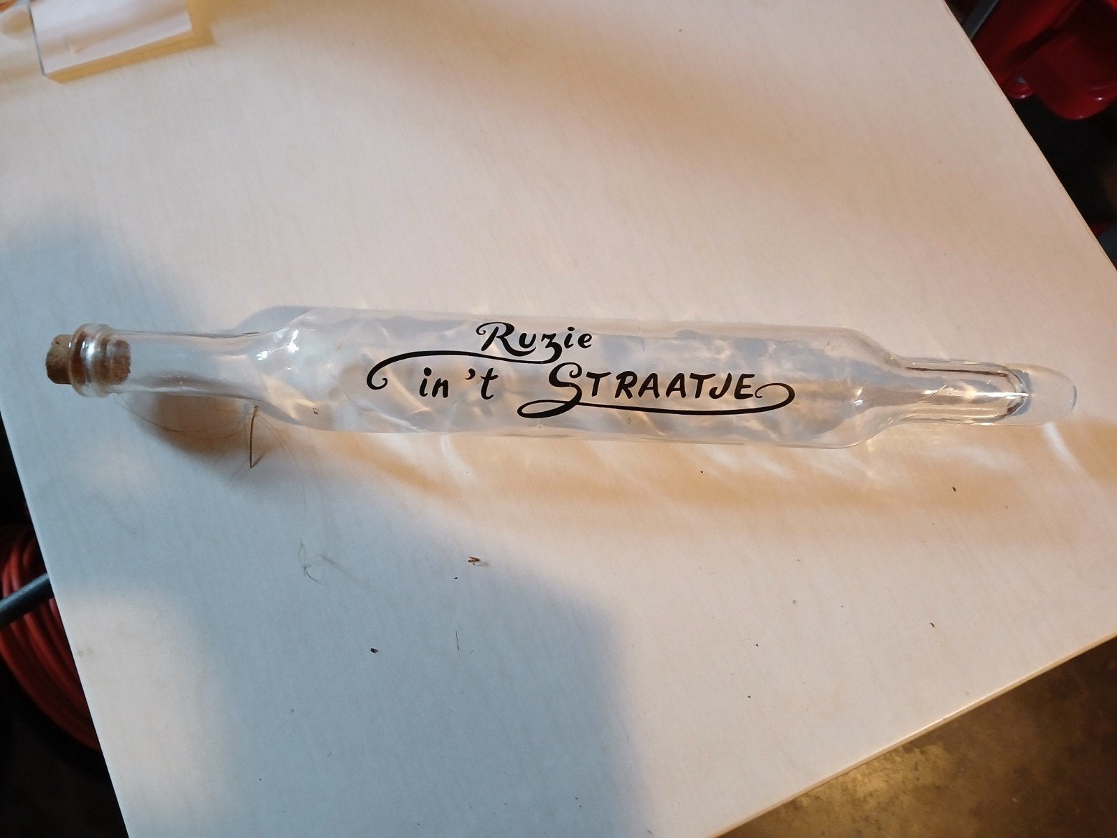 Glazen fles met opschrift "ruzie in 't straatje ", Ophalen of Verzenden