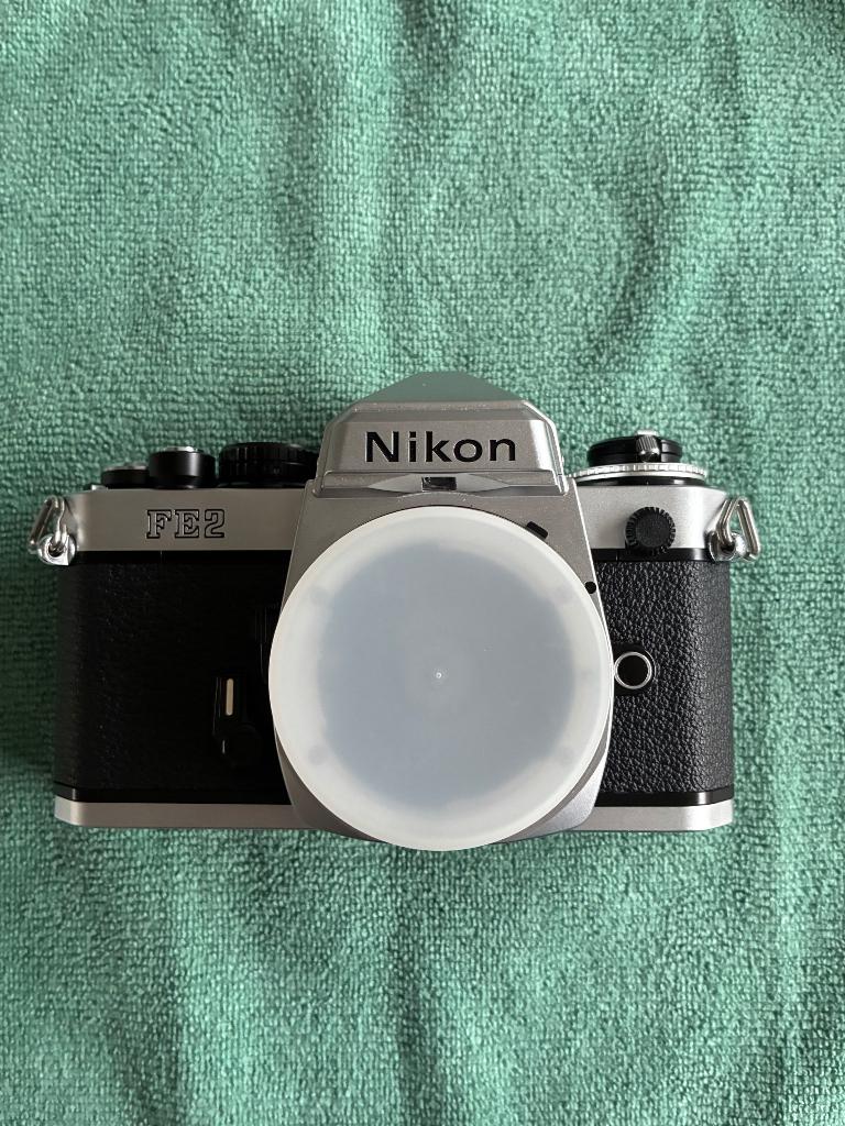 Nikon filmcamera lot: FE2, FE, 5 lenzen + Nikon F Photomic, Audio, Tv en Foto, Fotocamera's Analoog, Ophalen, Gebruikt, Spiegelreflex