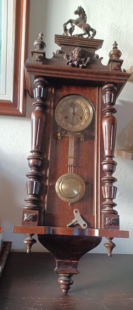houten wandklok, Ophalen