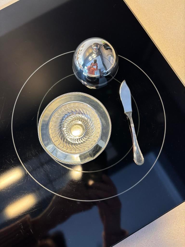Verzilverd botervlootje met mesje, Ophalen
