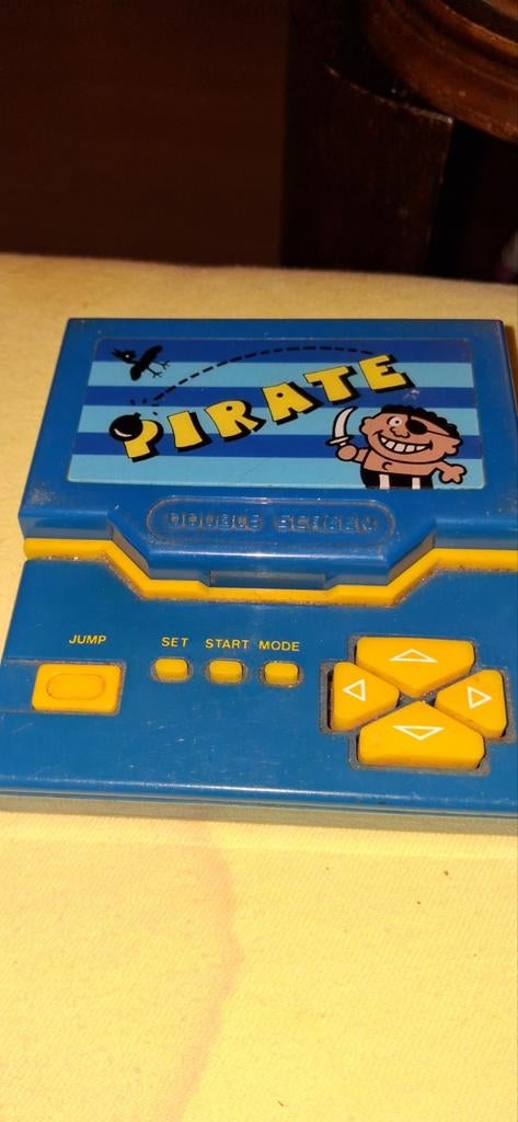 Titel: Vintage Pirate Double Screen Handheld LCD Game (Tandy, Ophalen of Verzenden