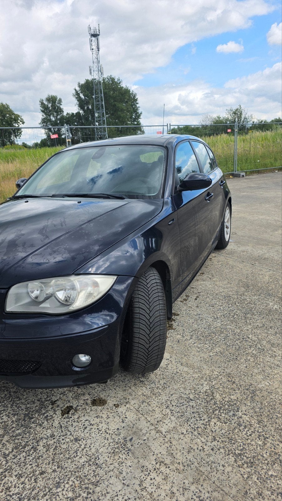 Bmw serie 1 116i 2006, Auto's, Achterwielaandrijving, Zwart, 4 cilinders, Leder