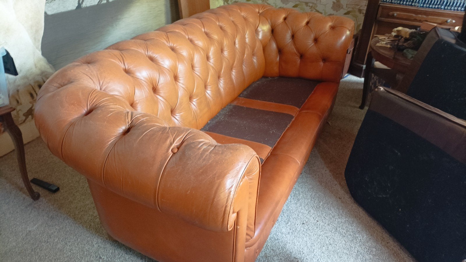 Chesterfield à restaurer, Enlèvement