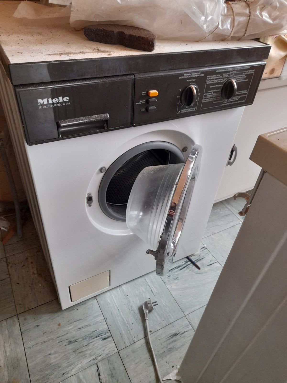 wasmachine miele, Ophalen