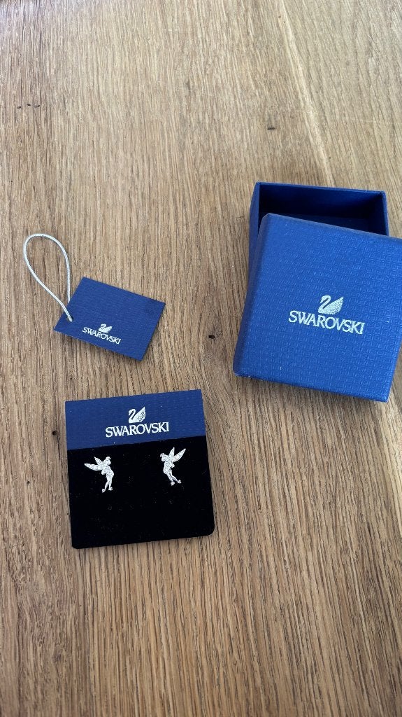 Swarovski oorbellen tinkelbel, Ophalen of Verzenden, Zo goed als nieuw, Zilver, Knopjes of Stekers