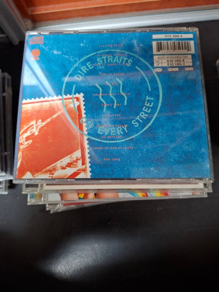 cd - dire straits - on every street, CD & DVD, CD | Rock, Enlèvement ou Envoi, Comprend un livret, Comme neuf, Rock classique
