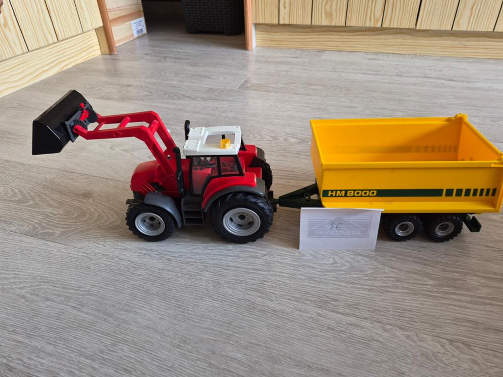 Tractor met schop en met kar, Ophalen