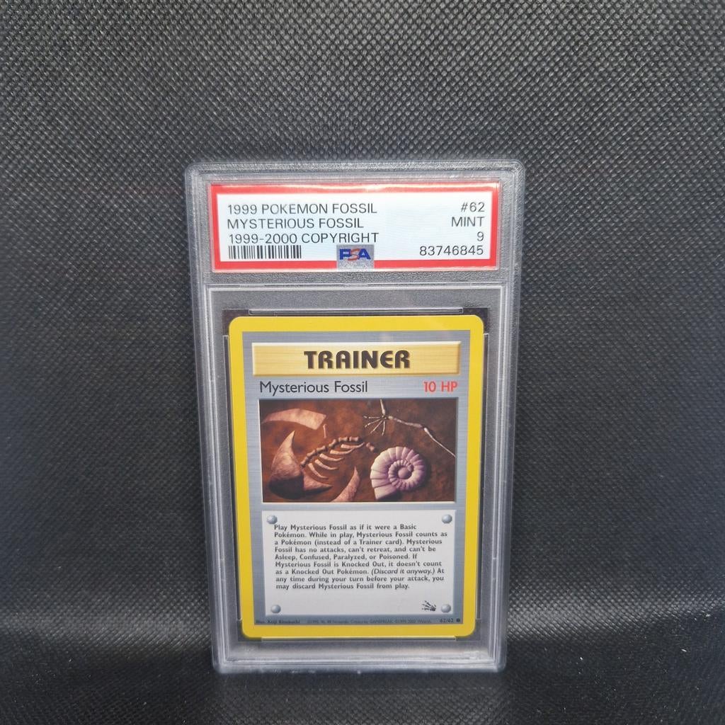 Mysterious Fossil 1999-2000 Copyright Fossil PSA 9, Hobby en Vrije tijd, Verzamelkaartspellen | Pokémon, Ophalen of Verzenden