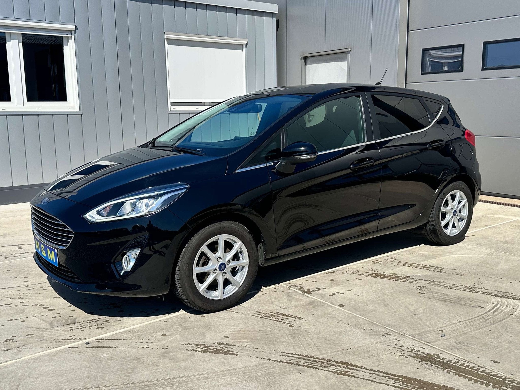 Ford Fiesta Fiesta 1.0 EcoBoost Titanium *12M garantie*, Auto's, Ford, Stof, Gebruikt, Zwart, Bedrijf