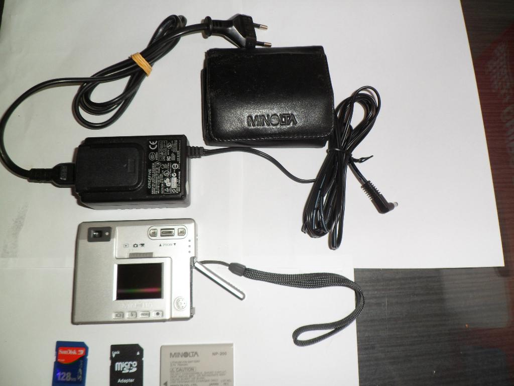 Digitale camera MINOLTA DIMAGE X, met lader, leder hoes+SD's, Audio, Tv en Foto, Ophalen, Gebruikt, Minolta