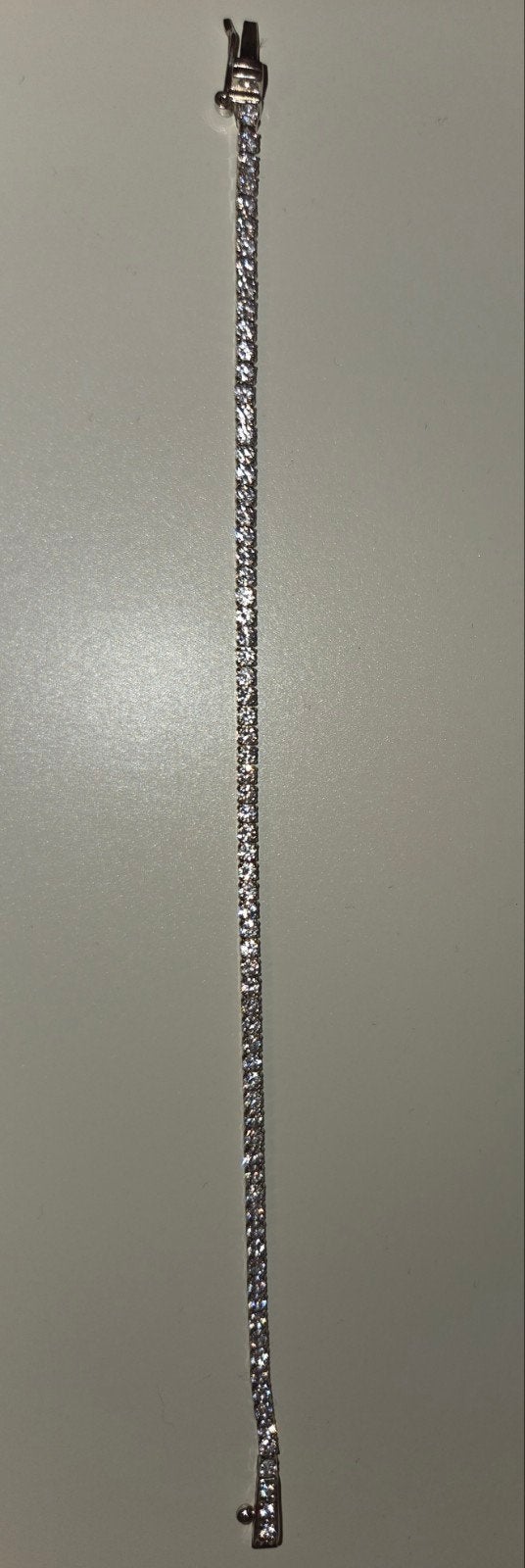Elastische tennisarmband, Ophalen