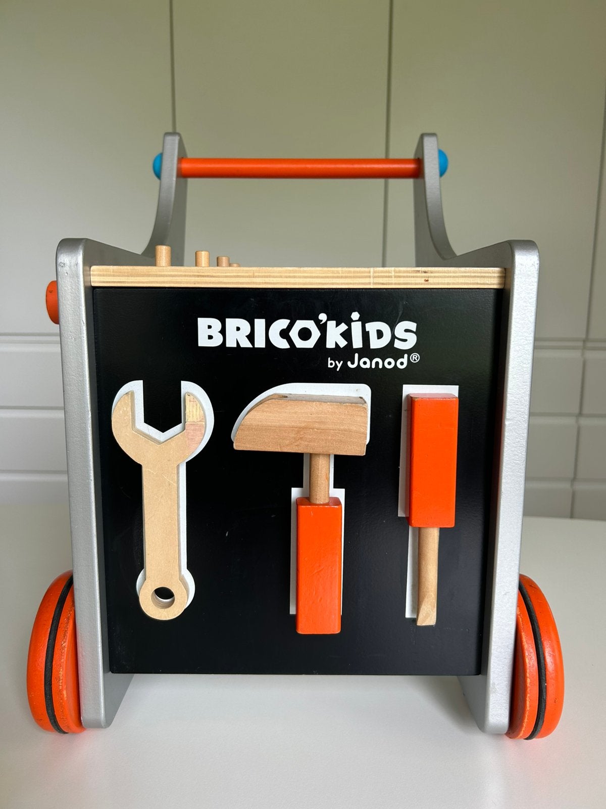 JANOD - Loopwagentje Brico’kids, Kinderen en Baby's, Speelgoed | Houten speelgoed, Ophalen, Gebruikt, Duw- of Trekspeelgoed
