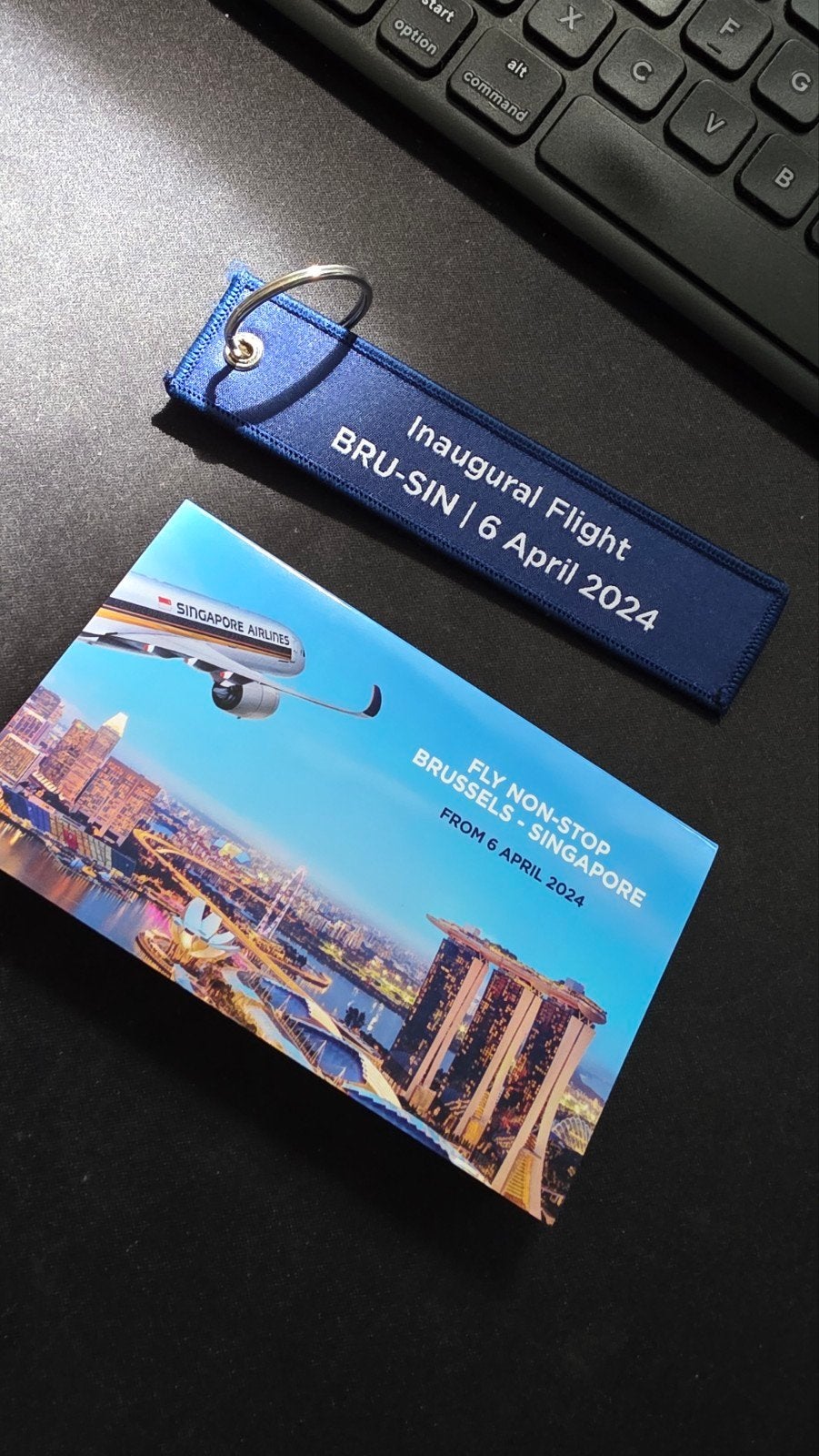 Singapore Airlines sleutelhanger en notepad, Verzenden