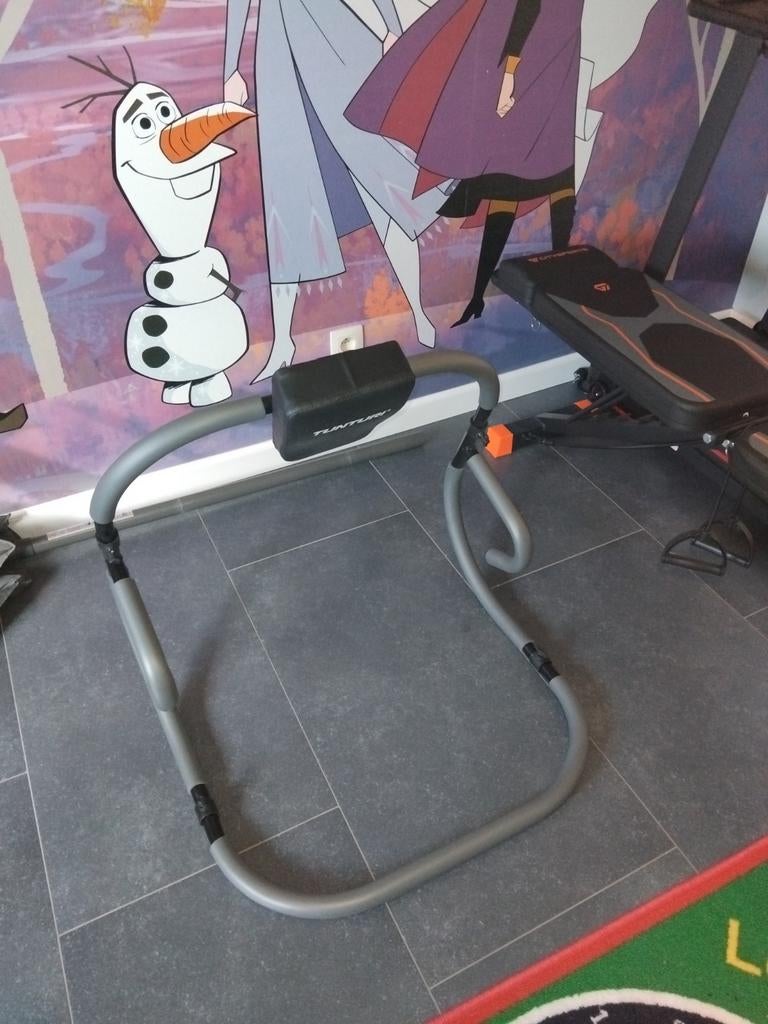 Buikspiertrainer, Ophalen