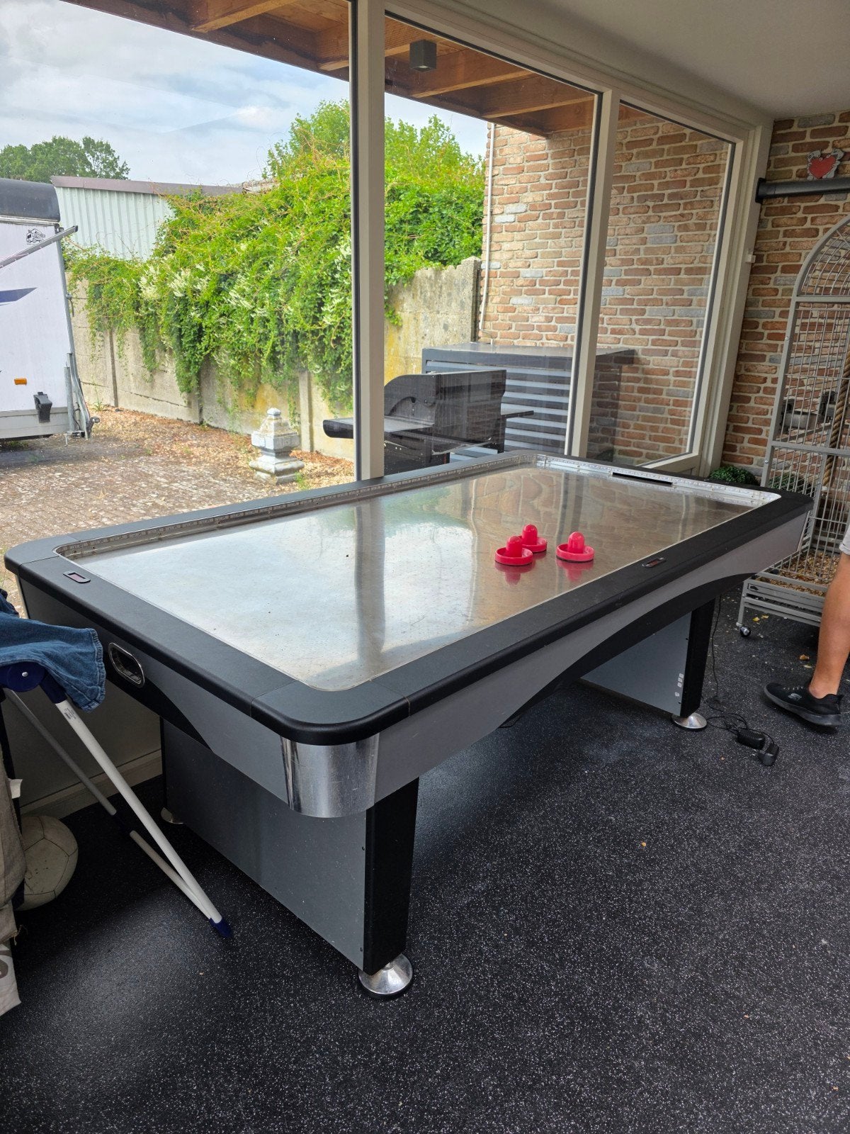 airhockytafel, Ophalen