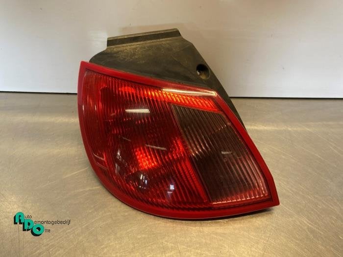 Feu arrière gauche d'un Mitsubishi Colt (Colt 04-), -, 3 mois de garantie, Utilisé, Mitsubishi