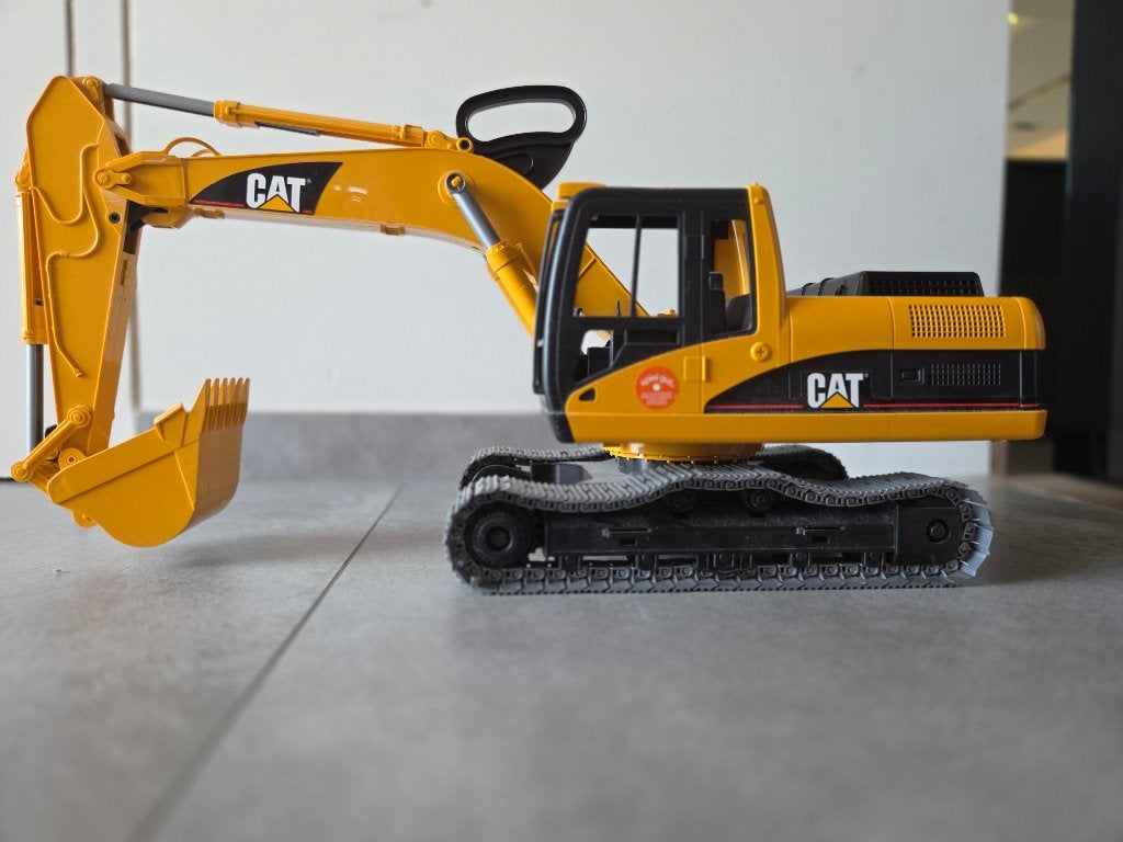 Bruder excavator CAT grijper BRO 2483, Enlèvement, Comme neuf