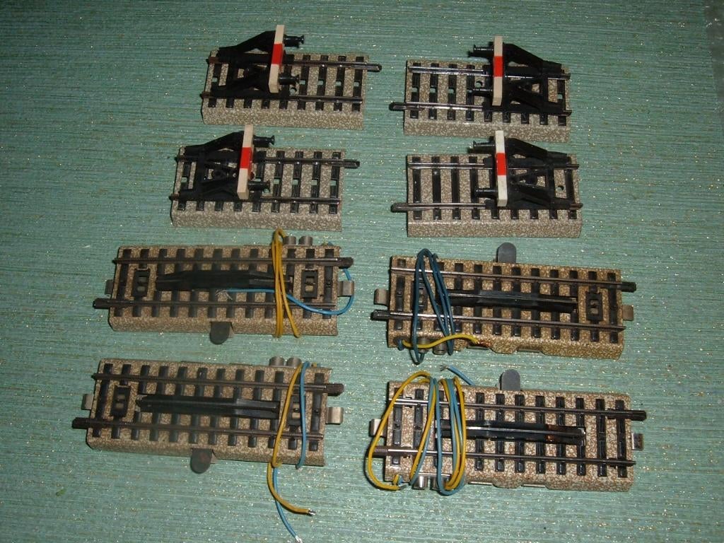 Marklin 4 Dételeurs 5112 + 4 butoirs 7190, Hobby & Loisirs créatifs, Enlèvement ou Envoi, Utilisé, Rails, Märklin