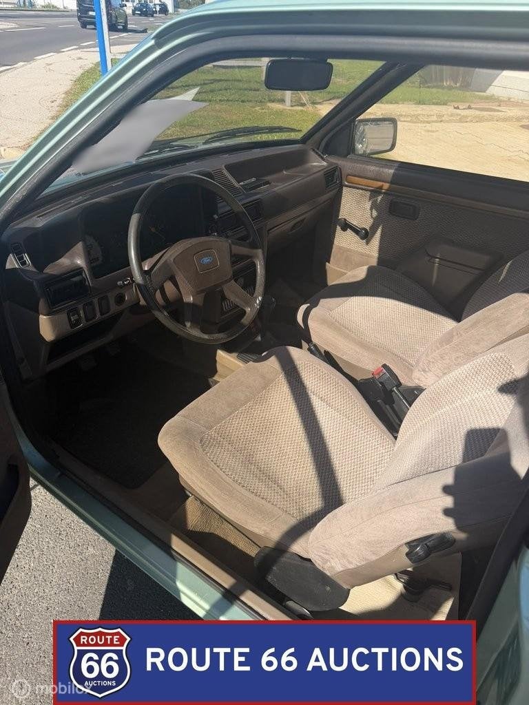 Ford Escort 1.3 Ghia | 1982 | Route 66 Auctions, Auto's, Zwart, Bedrijf, Handgeschakeld, Overige carrosserie