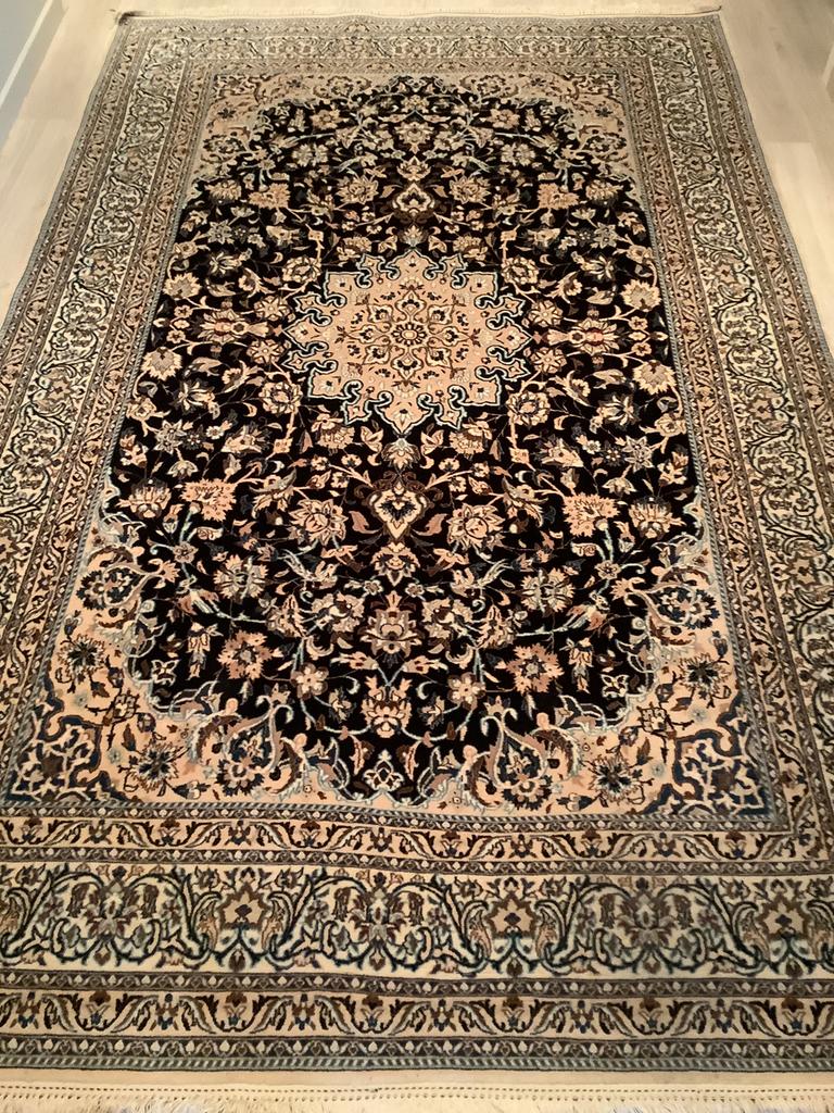 tapis persan Nain, Enlèvement
