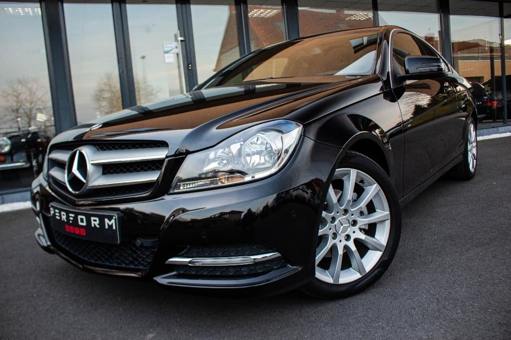 Mercedes-Benz C 220 Coupé *AMG*NAVI*PDC*1J GARANTIE*, Automaat, 4 zetels, Achterwielaandrijving, 1800 kg