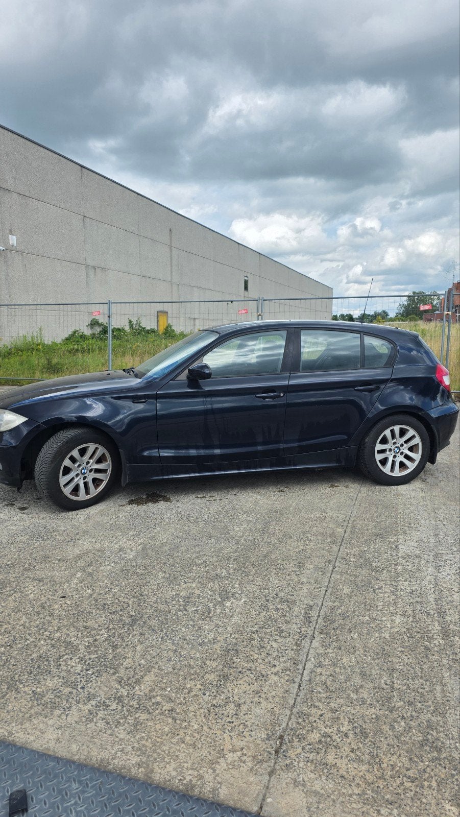 Bmw serie 1 116i 2006, Auto's, Achterwielaandrijving, Zwart, 4 cilinders, Leder