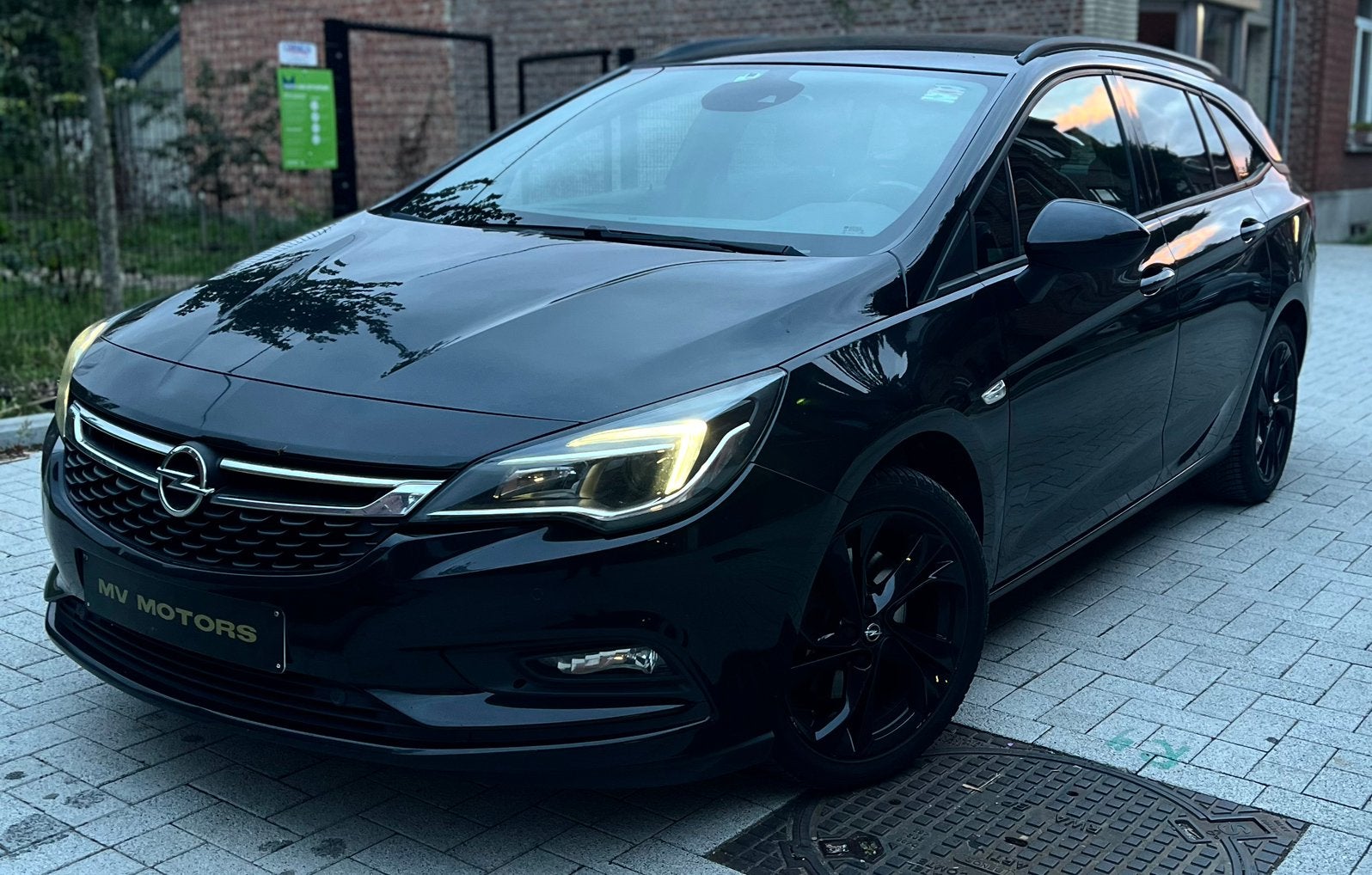 2018 Opel Astra Sports Tourer 1.6 CDTI 136 PK/automaat!, Automaat, Dealer onderhouden, Stof, Zwart