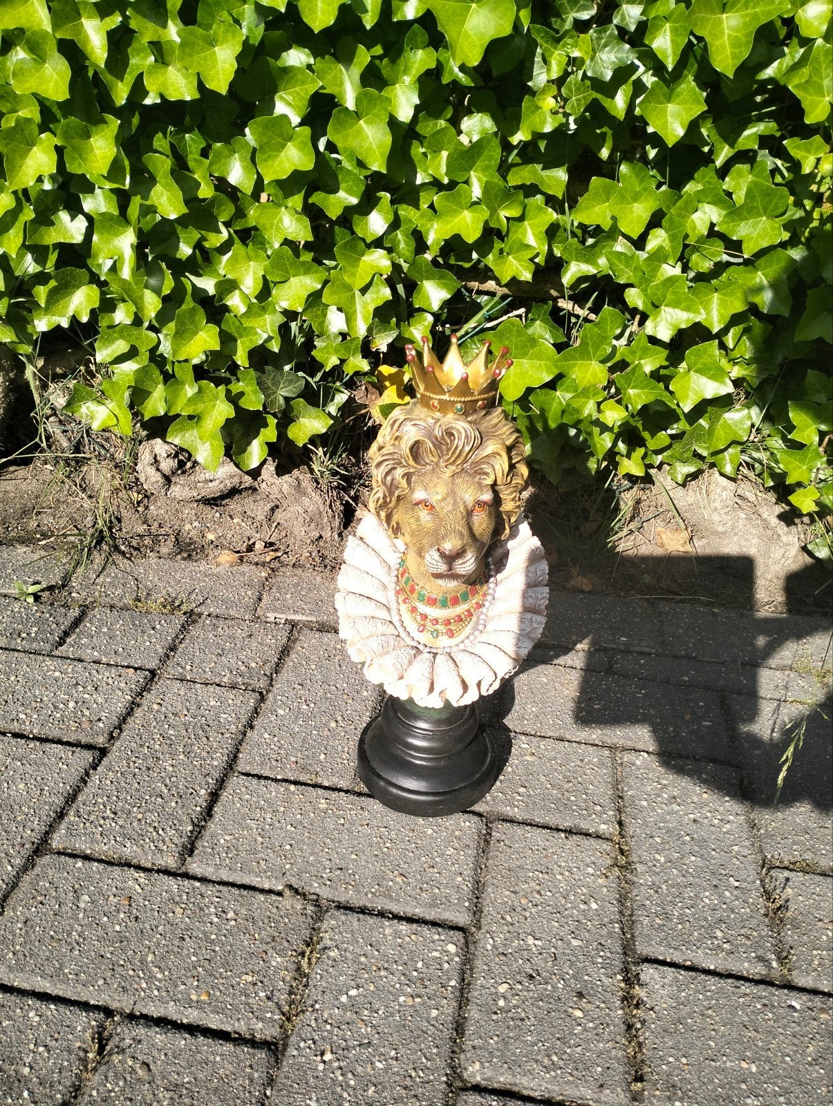Leeuwen beeld met kroon, Ophalen